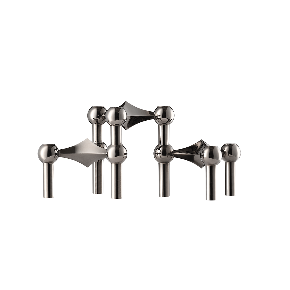 The iconic STOFF Nagel candle holder in dark metallic  edition is a futuristic expression brings elegance and a masculine vibe into the interior decor.