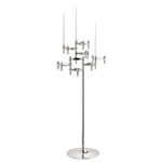 STOFF Nagel floor stand holding six faceted BMF candle holders in polished chrome with white taper candles, a freestanding modular sculpture