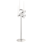 STOFF Nagel floor stand in chrome holding six original candle holders with white taper candles, a freestanding modular sculpture