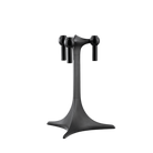 STOFF Nagel tabletop stand in black, a single stemmed stand holding three taper candles