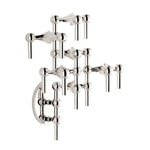 STOFF Nagel chrome wall hanger with modular candle holders built into a tall vertical arrangement, holding taper candles