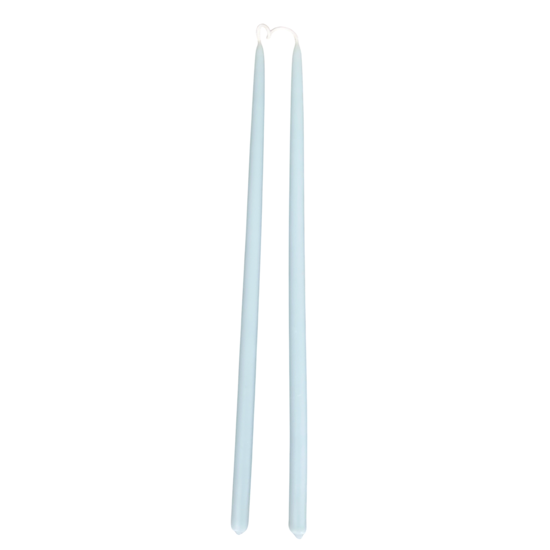 GLŌAM 12" hand-dipped thin beeswax taper candles in Azure — a clear cool blue, made in Santa Barbara with natural plant-based pigments