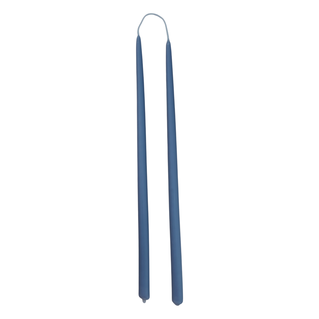 GLŌAM 12" hand-dipped thin beeswax taper candles in M Denim — a soft washed blue, made in Santa Barbara with natural plant-based pigments