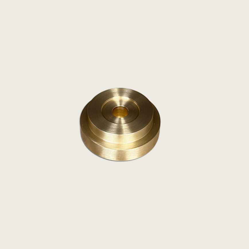 GLŌAM thin taper golden brass holder, a sculptural minimalist brass base made for Thin beeswax tapers, solid polished brass